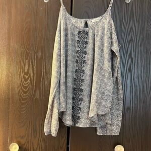 Rewind spaghetti strap, exposed shoulder, long sleeved top. Size Medium.